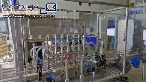 Linha completa de envase com envasadora rotuladora rosqueadora posicionador frascos Tecman Nelpas Tecnoenvase Tudela para l�quidos cosm�ticos